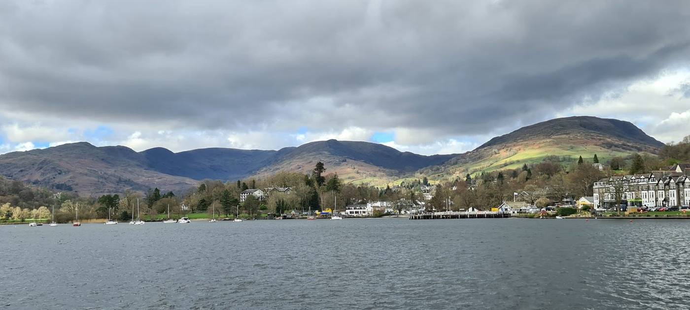 Lake Windermere on a still day, with the fells beyond
